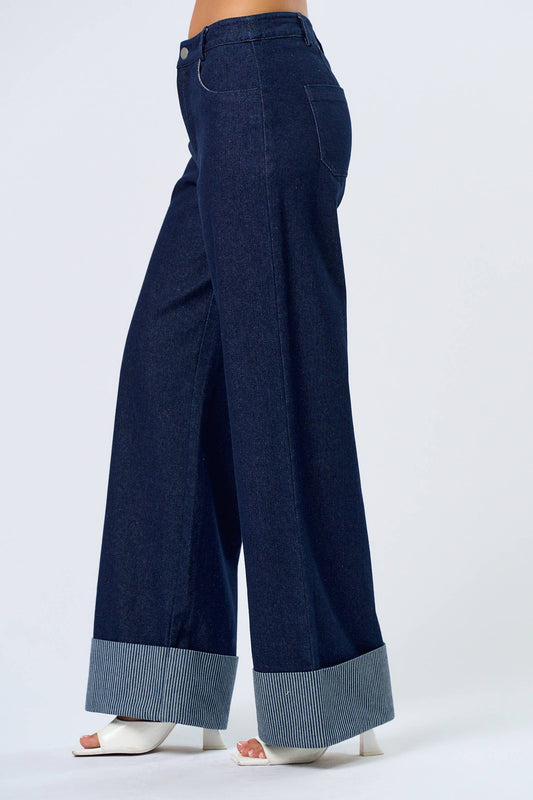 Wide-leg dark denim jeans with striped cuff. Stylish, comfortable, and perfect for casual outings.