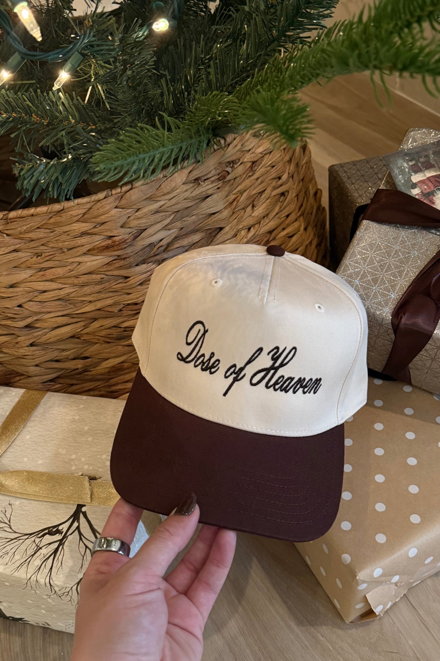 Cream and brown baseball cap with 'Dose of Heaven' embroidered text, perfect for casual wear.