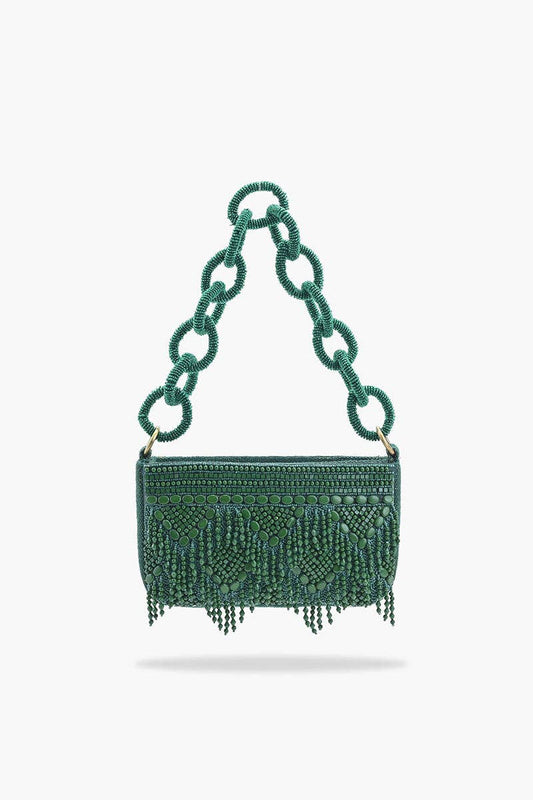 Green beaded handbag with chain handle on a white background