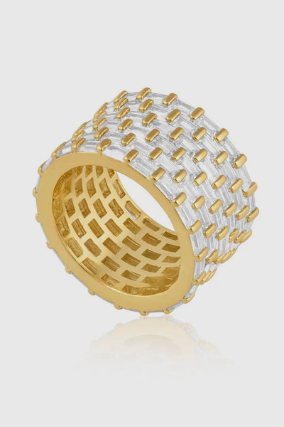 Stylish gold and silver woven ring, crafted with intricate detailing and a unique design.