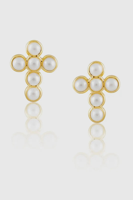 Gold earrings with pearl-like stones on a white background
