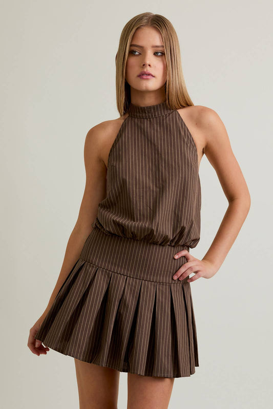 Brown striped halter neck dress with pleated skirt, perfect for casual and semi-formal occasions.