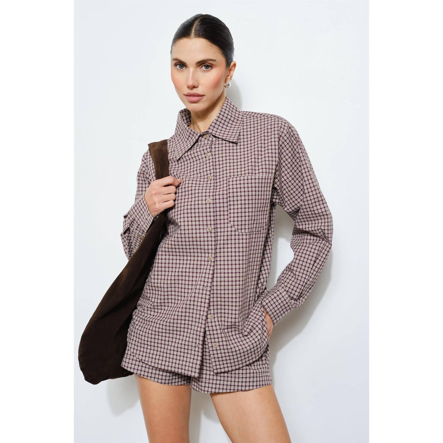 Stylish women's plaid shirt in brown and cream, made of soft cotton, featuring a collared neckline and front pocket.
