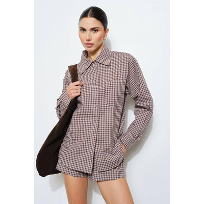 Stylish women's plaid shirt in brown and cream, made of soft cotton, featuring a collared neckline and front pocket.
